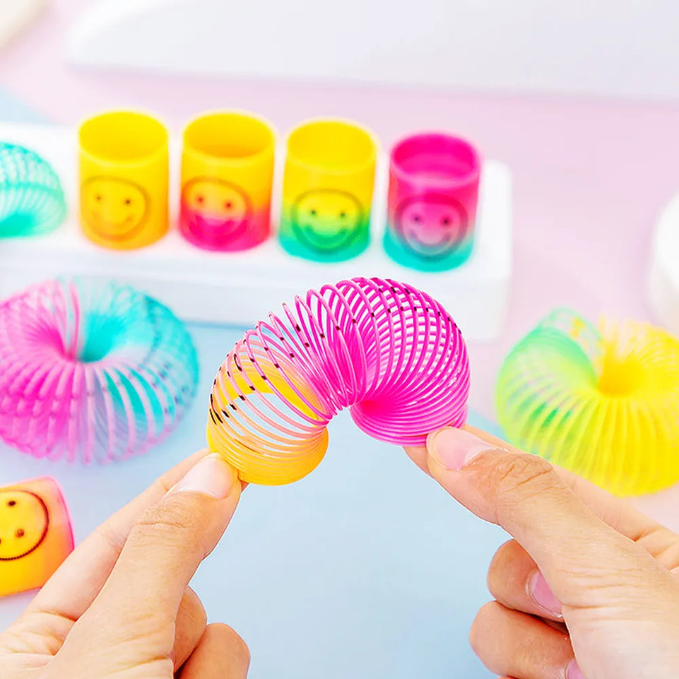 12Pcs Rainbow Smile Magic Springs Circle Toys for Children Birthday Party Favors Giveaway Gifts Baby Shower Pinata Fillers