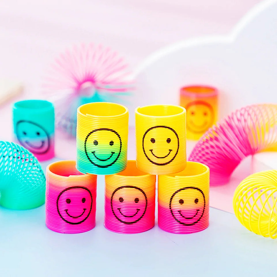 12Pcs Rainbow Smile Magic Springs Circle Toys for Children Birthday Party Favors Giveaway Gifts Baby Shower Pinata Fillers